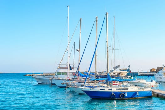 Larnaca marina with yachts and sailboats in bright sunshine daytime, Cyprus