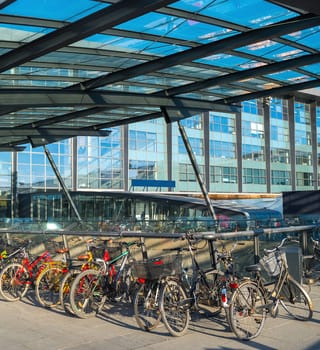 Bicycles parking by the Kastrup airport at sunset, Copenhagen, Denmark