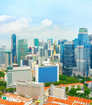 Aerial cityscape of Singapore modern downtown with chinatown district below