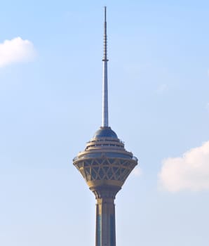 Milad Tower with blue sky and clouds in the dayime. Tehran, Iran
