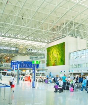 FRANKFURT, GERMANY - AUGUST 29, 2018: People at Frankfurt am Main airport hall. Frankfurt Airport is the busiest airport by passenger traffic in Germany as well as the 4th busiest in Europe