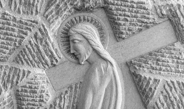Bas relief of Jesus carrying his cross, on the way to his crucifixion. Ideal for the easter concept, resurrection and other.