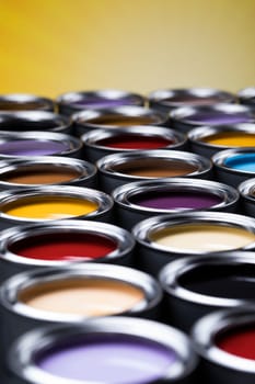 Collection of colored paints cans