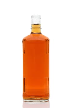 Glass bottle of whiskey on a white background