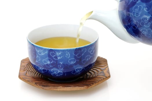 Japanese green tea in a tea set with cup and pot