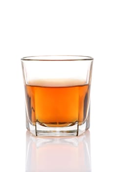 Glass cup of whiskey on a white background
