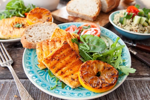 BBQ grilled cheese with fresh salad and bread