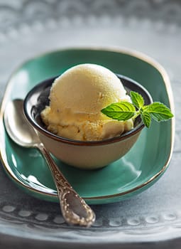 Homemade Organic Vanilla Ice Cream scoop in cup