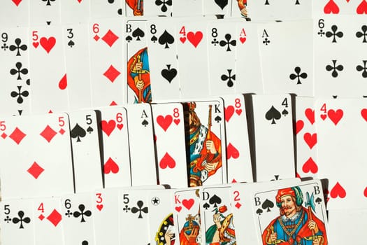 Various colorful playing cards, background picture, abstract