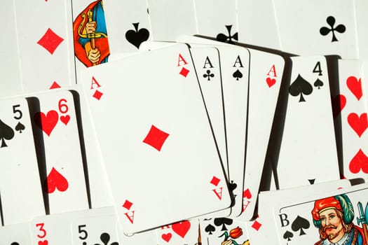 Four aces, various colorful playing cards, background picture, abstract