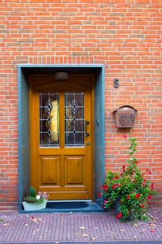 wooden house door in German small town, Grieth, North-Rhine Westphalia