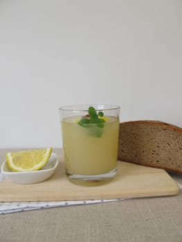 Kvass, homemade bread beer with lemon and mint