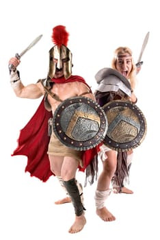 Ancient warrior or Gladiator couple posing in a white background