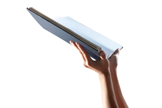 Muslim hands holding quran open isolated over white background