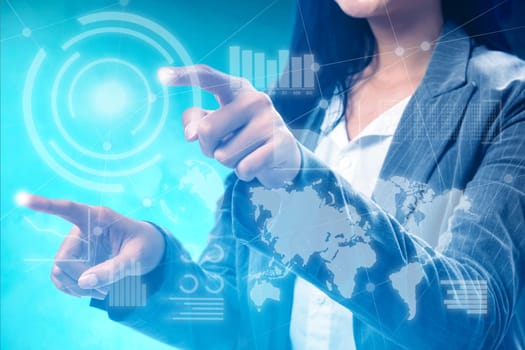 Business woman touch virtual screen which display the interface of financial chart and world maps. Digital technology concept