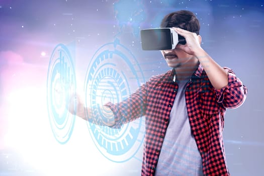 Asian man touching a circle on digital interface with virtual reality device display the world map and binary code. Augmented reality technology