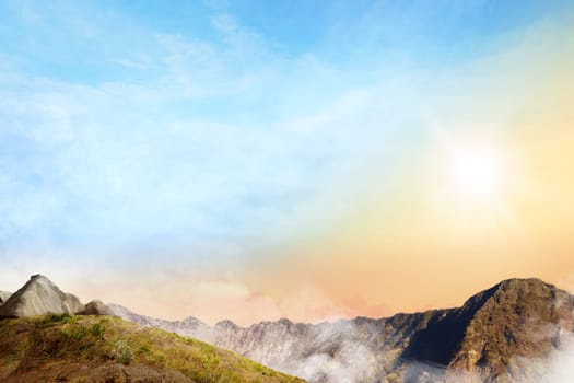 Panoramic views of top of the mountain with clouds fog on the morning