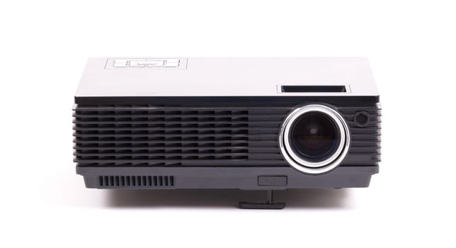 Black home cinema projector, isolated on white background