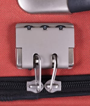 Combination lock on suitcase travel bag. Number, steel - Red bag