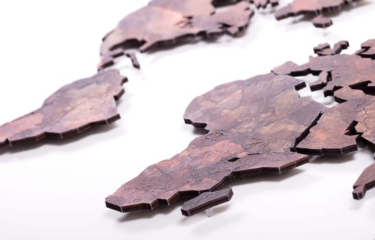 Roughly outlined world map on a kitchen wall, selective focus on Africa