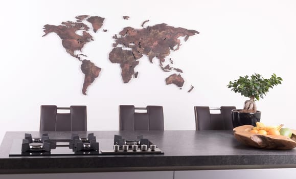 Roughly outlined world map on a kitchen wall