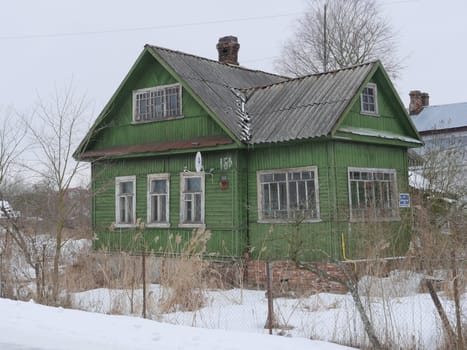 Russia, Leningrad region March 12, 2016,  aged wooden house of the Soviet construction Circa 1950