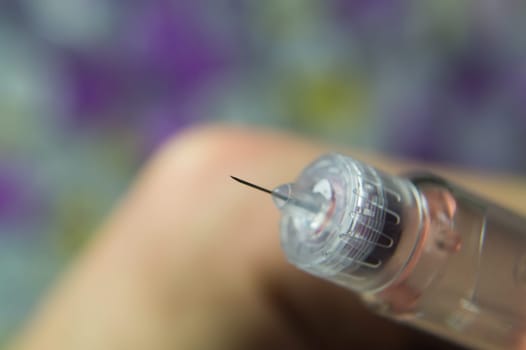 Diabetes syringe with needle closeup