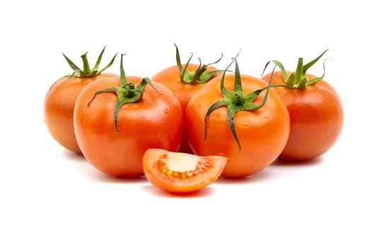 Tomato closeup on white background. Selective focus and crop fragment