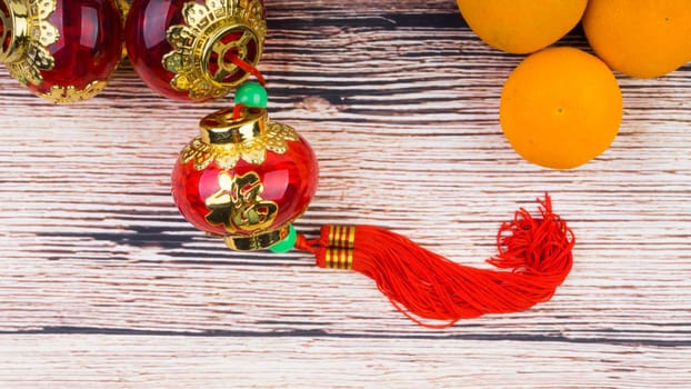 Kuala Lumpur, Malaysia- September 12, 2017:  Mandarin Orange, Red Envelopes, lantern land Gold Ingots. New Year background concept