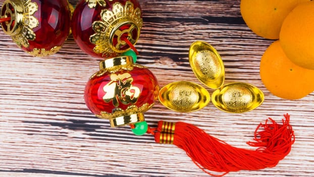 Kuala Lumpur, Malaysia- September 12, 2017:  Mandarin Orange, Red Envelopes, lantern land Gold Ingots. New Year background concept