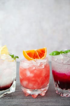 Variety of colorful cocktails and longdrinks on ice