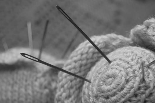 Handmade knitting wool texture background closeup needlework. healthy food concept