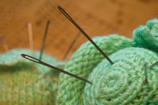 Handmade knitting wool texture background closeup needlework. healthy food concept