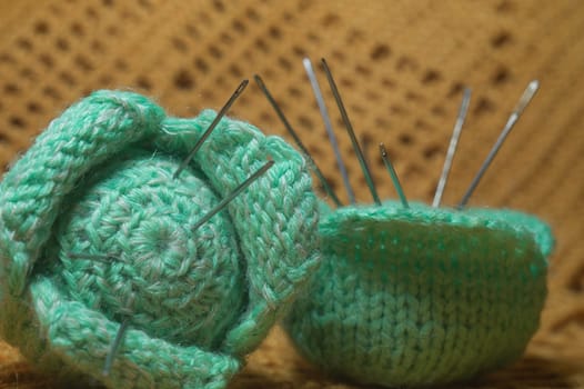 Handmade knitting wool texture background closeup needlework. healthy food concept