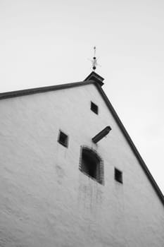 Old wall with window in old town Tallin Estonia texture background