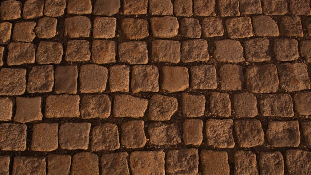 Stone pavement texture. cobblestone background
