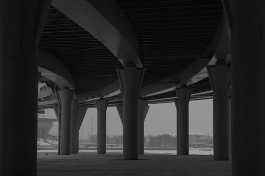 Architecture lines under the bridge. Speedway black and white