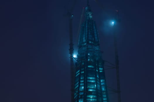 Skyscraper construction at nicht background