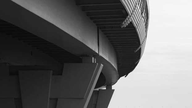 Architecture lines under the bridge. Speedway black and white