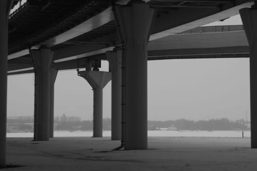 Architecture lines under the bridge. Speedway black and white