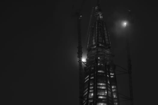 Skyscraper construction at nicht background