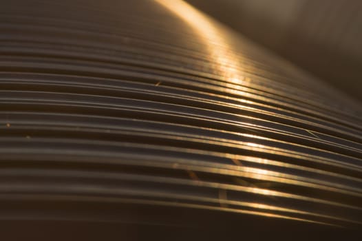 Golden metal pipes closeup background