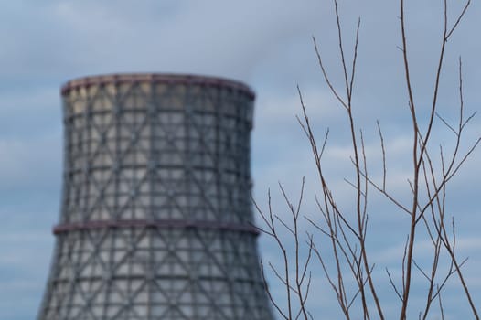 Thermal power plant with smoking chimney. Industrial background