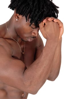 An African American man flexing his muscles with his fists on his .forehead and eyes closed, isolated for white background.