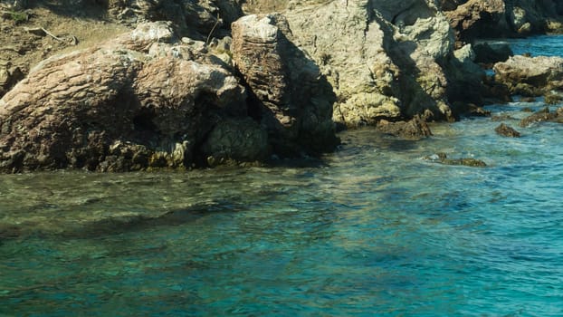 Mountain and sea. coastline with a rock