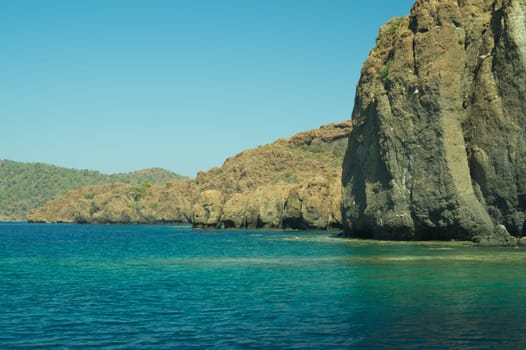 Mountain and sea. rocky cliff background
