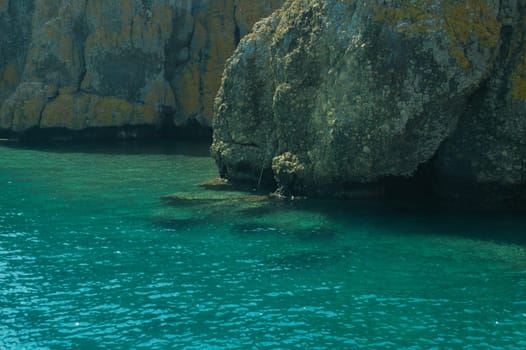 Mountain and sea. rocky cliff background