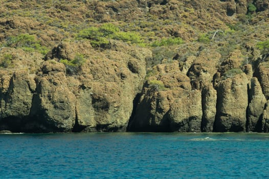 Mountain and sea. rocky cliff background
