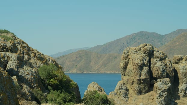 Mountain and sea. rocky cliff background