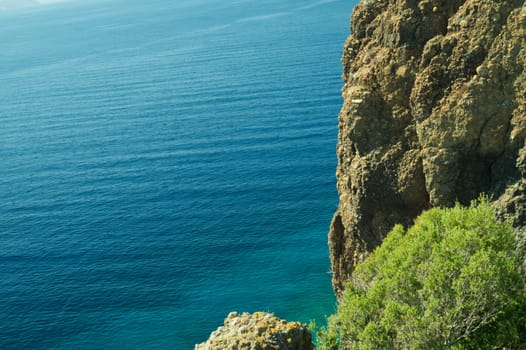 Mountain and sea. rocky cliff background